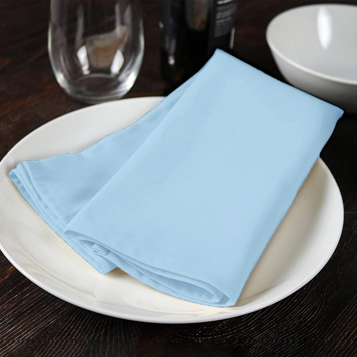 Close-up of hemmed edges on Avalon Kitchen napkin showing durable stitching