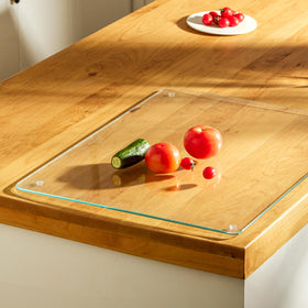 AVIDORAK large tempered glass cutting board with 60x45 cm surface for versatile kitchen prep.