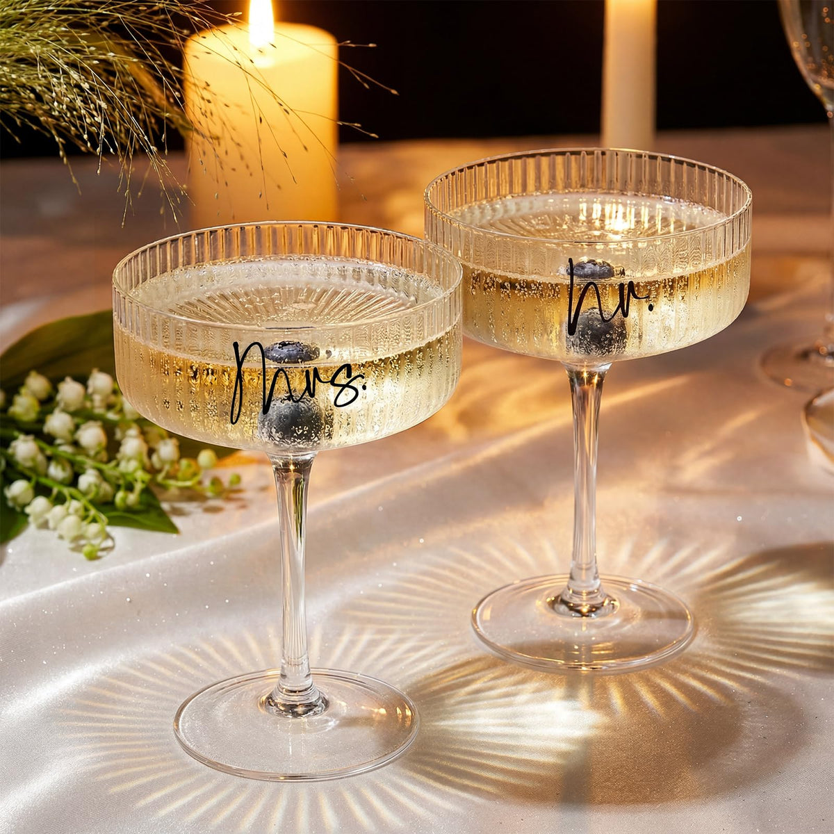 AW BRIDAL signature Mr and Mrs toast glasses on a table