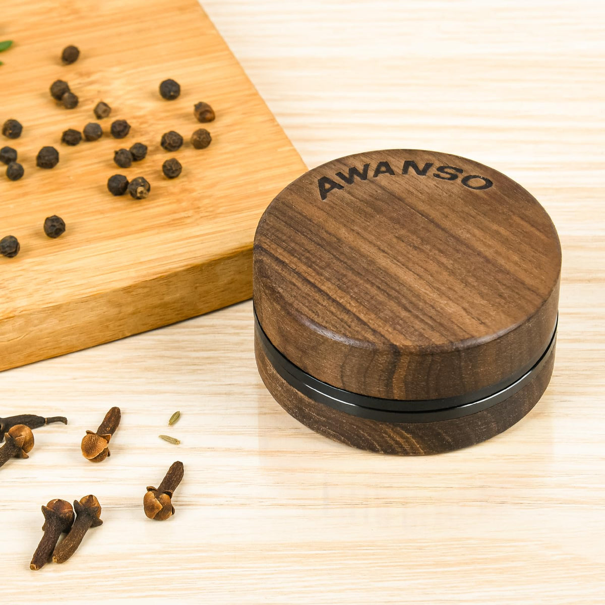 Awanso lightweight two-piece grinder for home or travel spice grinding.