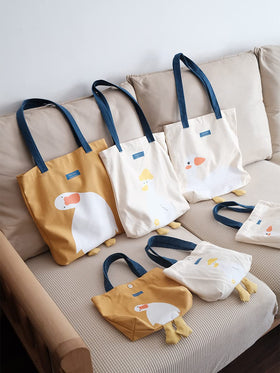 AWXZOM yellow duck tote in action as lunch and grocery bag