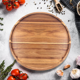 Ayiaren acacia round tray makes a thoughtful housewarming gift and holiday present.