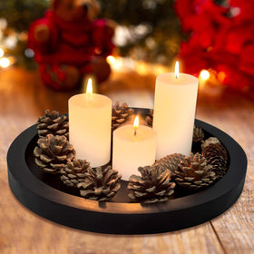 Ayiaren tray arranged as a coffee table centerpiece with decor and candles.