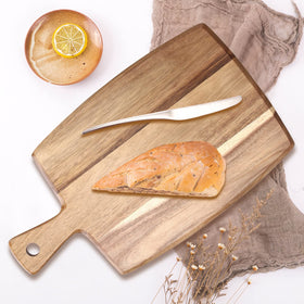 Ayiaren serving board for bread, fruits, and cheese during gatherings.