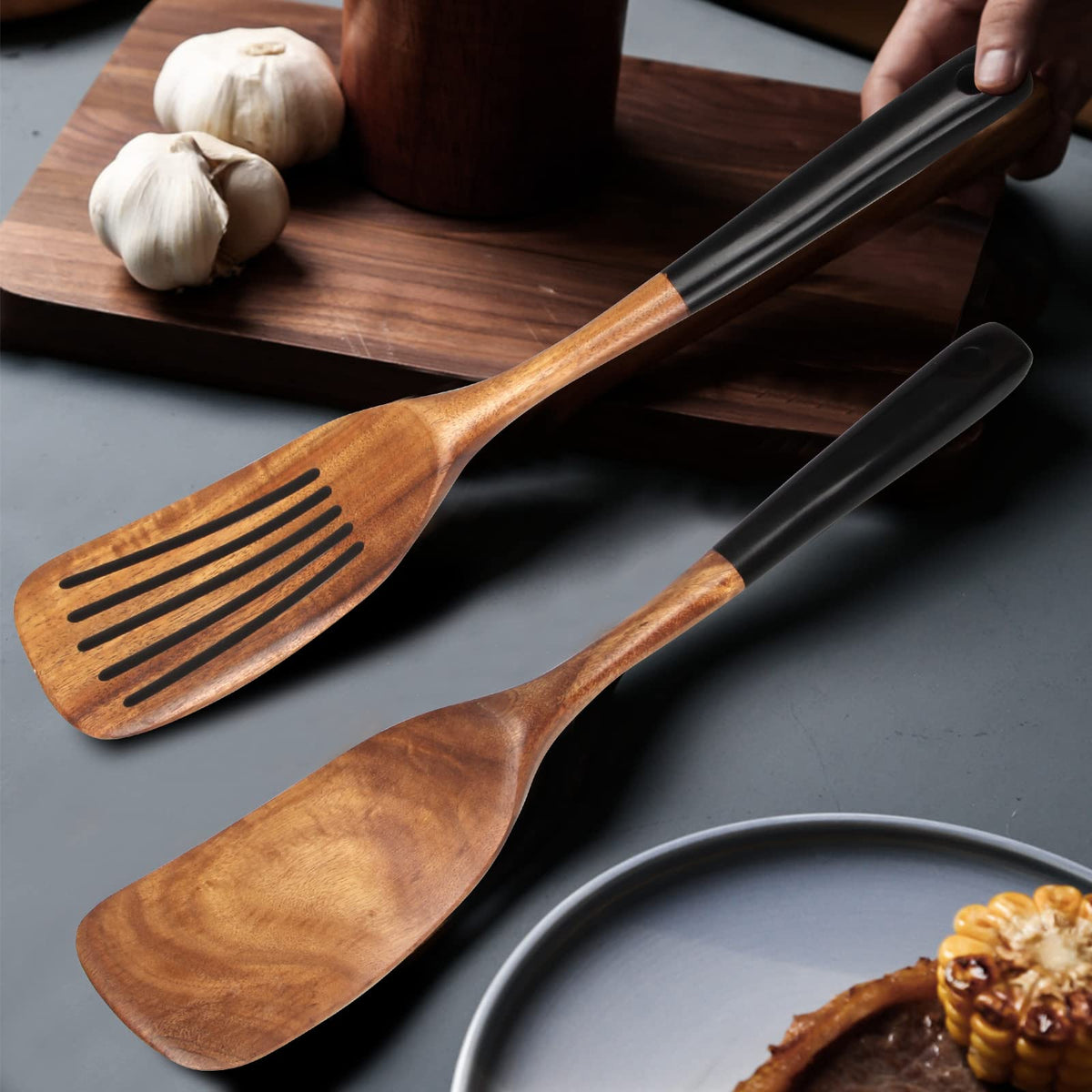 Ayiaren teak wood grain close-up highlights durable natural finish.
