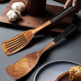 Ayiaren teak wood grain close-up highlights durable natural finish.