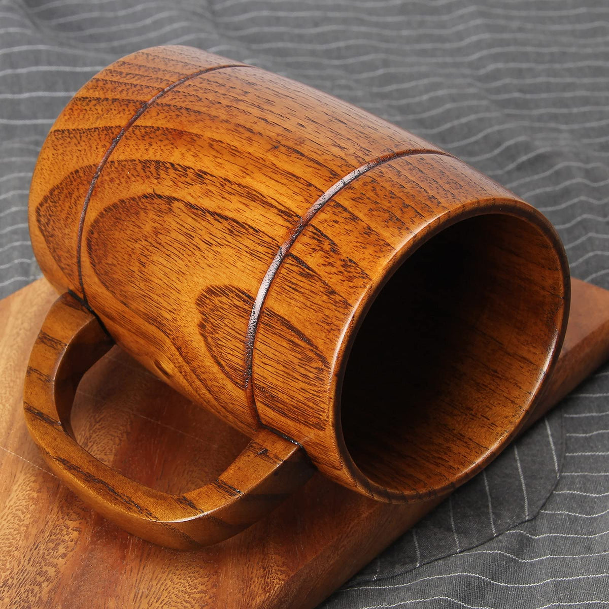 Ayiaren wooden beer mug held in hand with comfortable grip