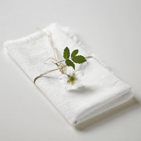Ayuzawa 18x18 fringe white napkin showcasing hotel-style service at home