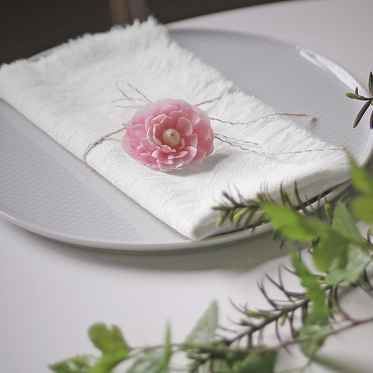 Ayuzawa fringe napkin detail highlighting handcrafted fringe edges