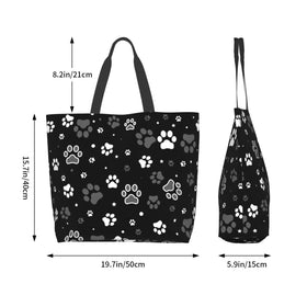 AZJOYLIFE dog paw tote bag at the beach shows sandproof design and practicality.