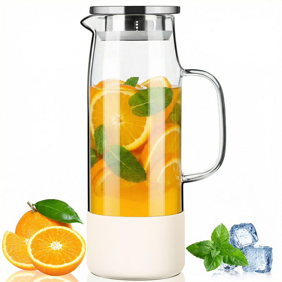 Baalaka glass pitcher with lid and handle for spill-free pouring.
