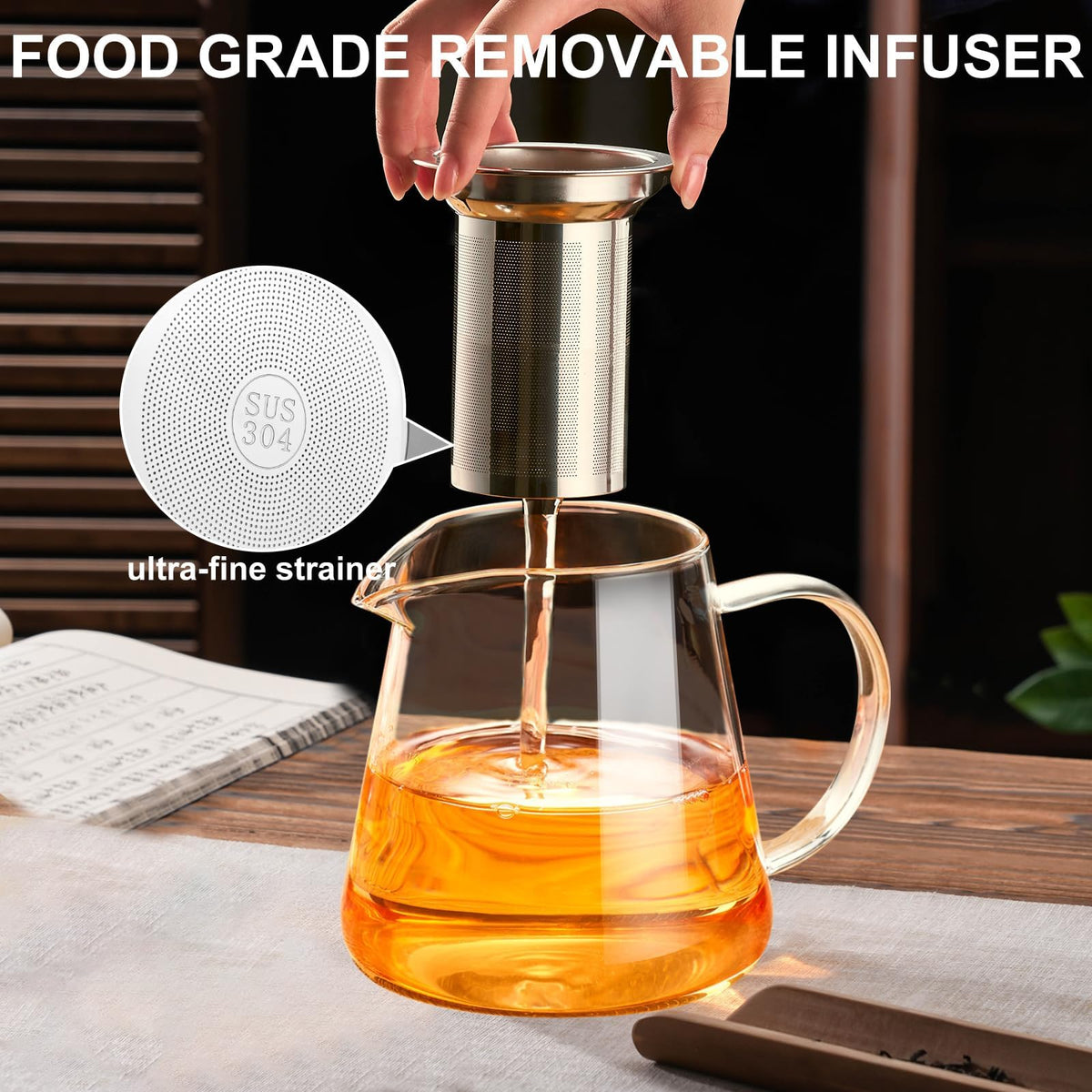 Baalaka glass teapot showing ergonomic handle for comfortable one handed pouring.