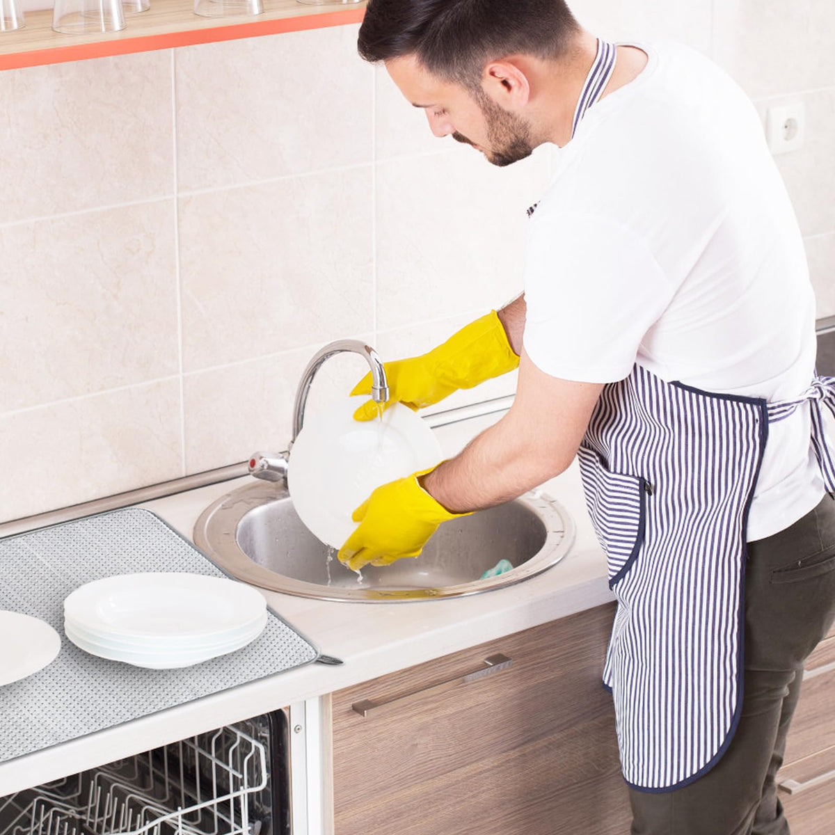 Baaxxango large gray mat keeps counters dry during busy cooking.