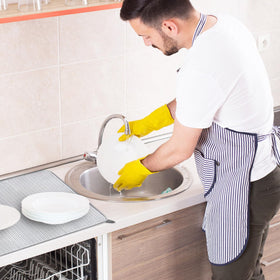 Baaxxango large gray mat keeps counters dry during busy cooking.