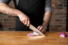 Babish 8-Inch Chef Knife meat slicing delivers clean cuts on proteins.
