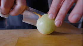 Babish 8-Inch Chef Knife vegetables chopped illustrates versatile kitchen performance.
