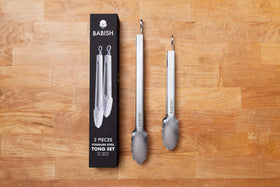 Babish brushed stainless steel tong for durable kitchen performance.