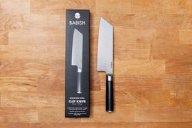Babish Clef hybrid design in action for precise chopping and scooping.