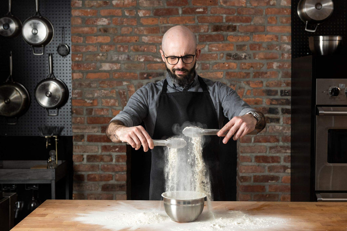 Babish dishwasher-safe stainless steel tongs withstand heat up to 500°F.