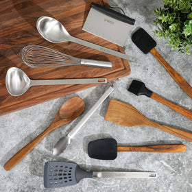 Babish silicone spoonula with wood handle, gentle on nonstick cookware.