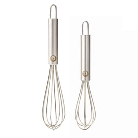 Babish Tiny Whisk 5-inch in-hand, compact for quick mixing in small bowls.
