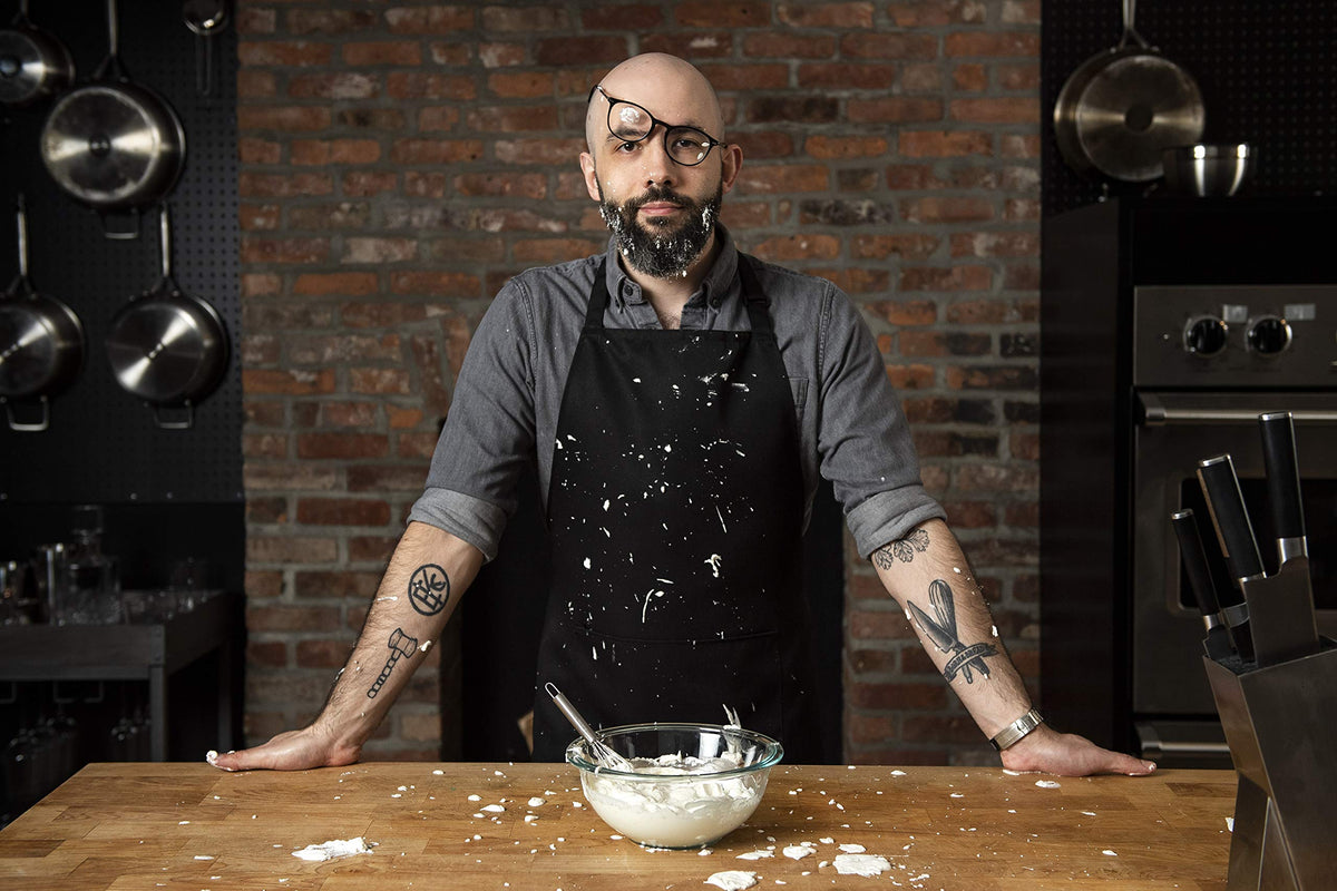 Babish Tiny Whisk in-use image shows quick mixing in a mug.