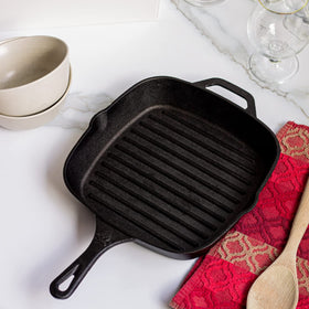 Backcountry Iron pan includes protective mitt for safe handling.