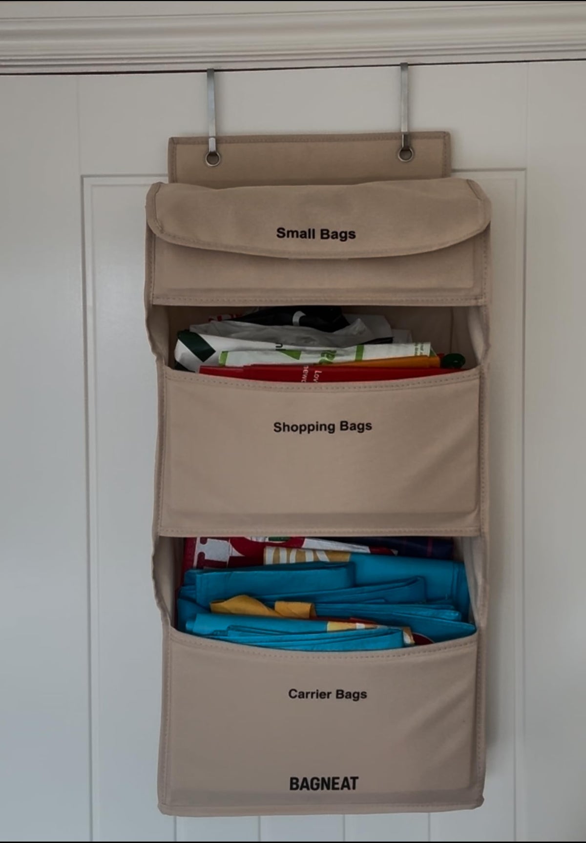 BAGNEAT's waterproof beige material resists spills and blends with kitchen decor.