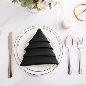 Close-up of Bailarina napkins with durable hemmed edges.