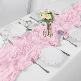 Bailarina wrinkled gauze fabric table runner adds soft drama to reception settings.