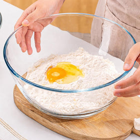 Bairuiin large glass bowl on a kitchen counter ready for mixing or storage.