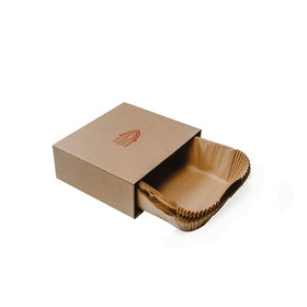 BakeBarn 8-inch square pre-formed parchment paper fits pans for easy lining and quick prep.