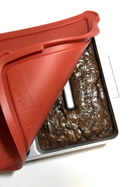 Baker's Edge brownie pan wedge inserted to convert to an 8x8 pan