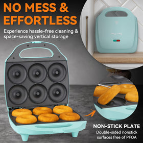 Donut maker with light indicators guiding baking and readiness.