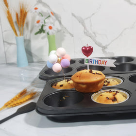 Bakexcel jumbo muffin pan easy cleanup image shows PFAS-free coating and simple removal.