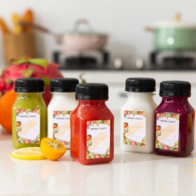 BAKHUK clear bottles showcase colorful beverages, perfect for DIY gifts or party favors.