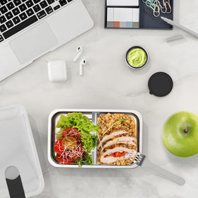 Bakpoco adjustable divider in use for customizable portions.