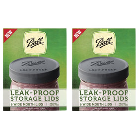 Ball leak-proof lids on a wide-mouth jar show secure sealing for preserved foods