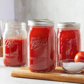 Ball Mason 16oz jar closeup highlighting smooth glass and secure lid.