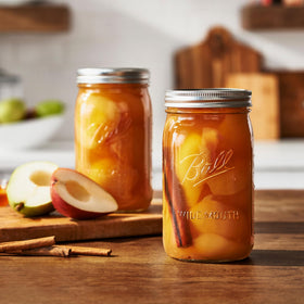 Ball wide-mouth jar in use for pickling vegetables and herbs.