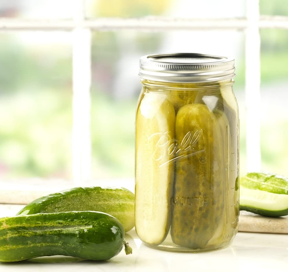 Ball preserving jar on kitchen counter for salsas and syrups