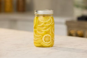 Ball Regular Mouth 32oz mason jar band closeup highlighting sturdy closures