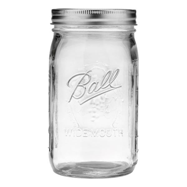 Ball wide-mouth glass jar with bands displayed for storage and gifting.