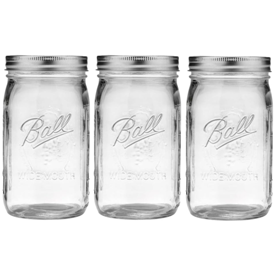 Ball wide mouth 32 oz jar with lids and bands for easy canning and storage.