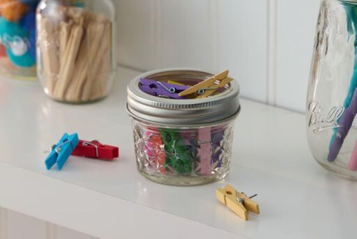 Ball wide-mouth jelly jar enhances kitchen aesthetics with practical 4 oz portions.