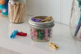 Ball wide-mouth jelly jar enhances kitchen aesthetics with practical 4 oz portions.