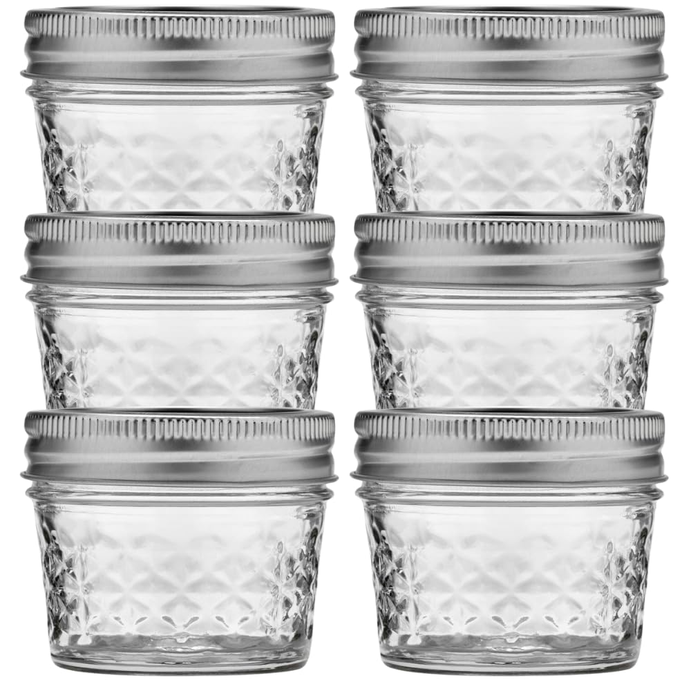 Ball wide-mouth jelly jar with quilted crystal pattern and lids, ideal for canning and storage.