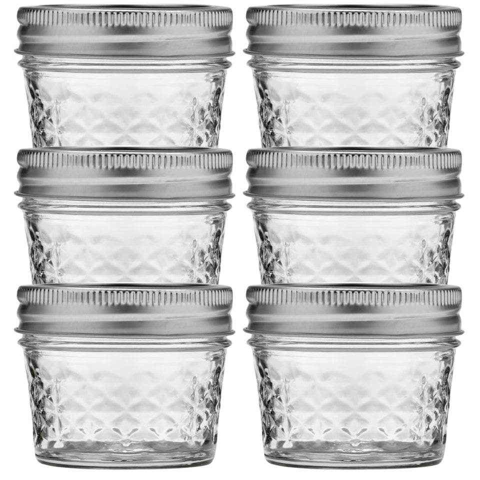 Ball wide-mouth jelly jar with quilted crystal pattern and lids, ideal for canning and storage.