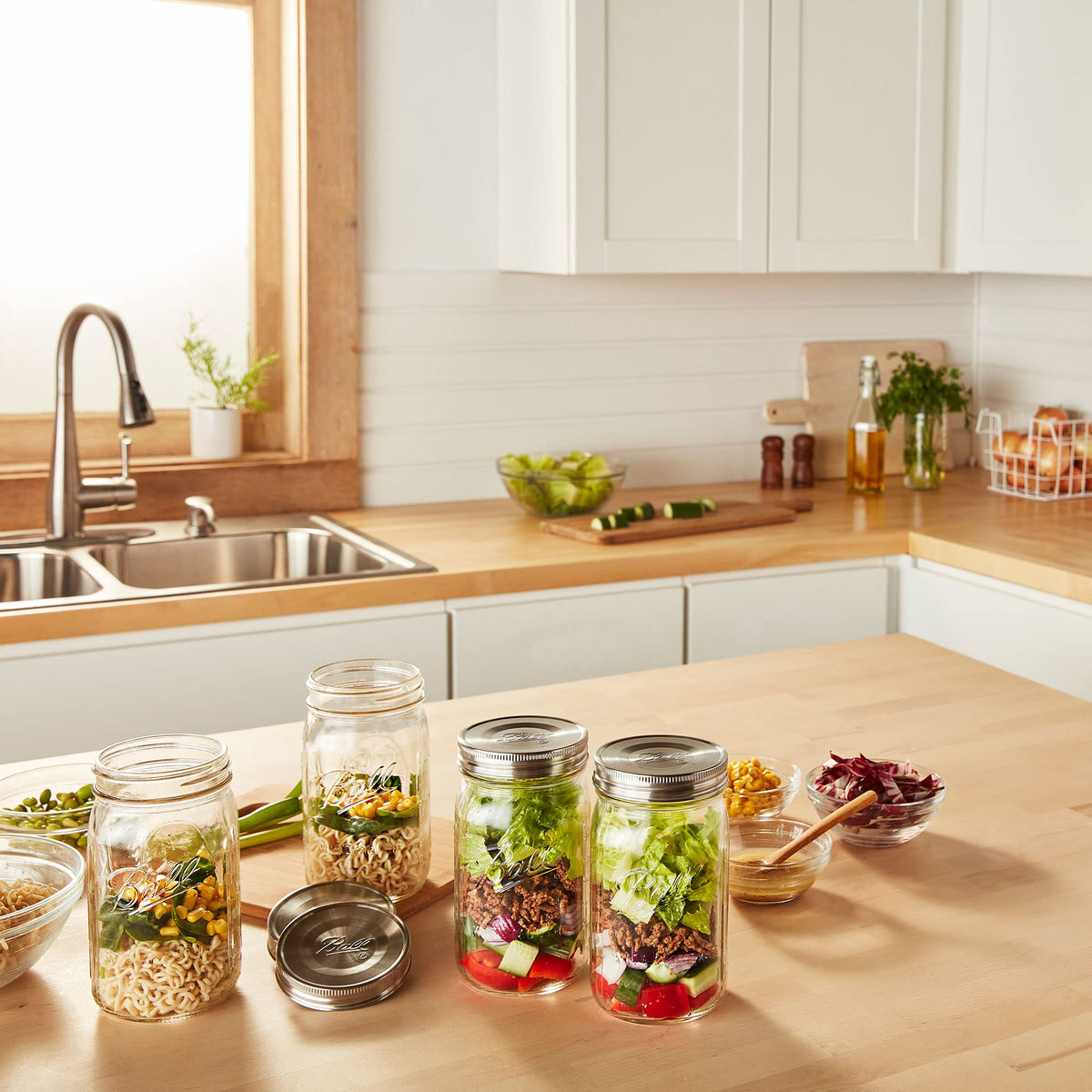 Ball wide-mouth stainless lids stack with jars for organized storage