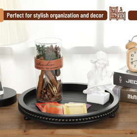 Bamboo Land round tray in black finish complements modern decor.